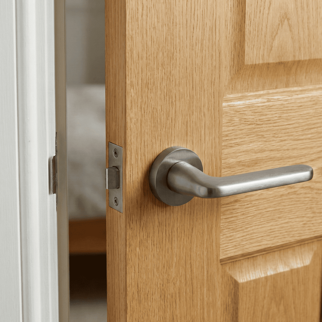 Deurklink op ronde rozet in aluminium RS-310 grafiet